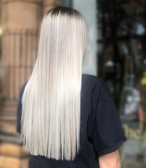 Platinum poker-straight blow dry at Gusto Hair London