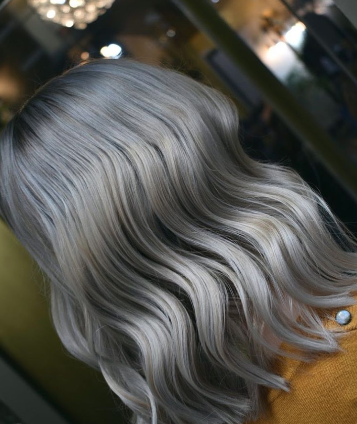 Shimmering curls blow dry at gusto hair salons in Londons West End