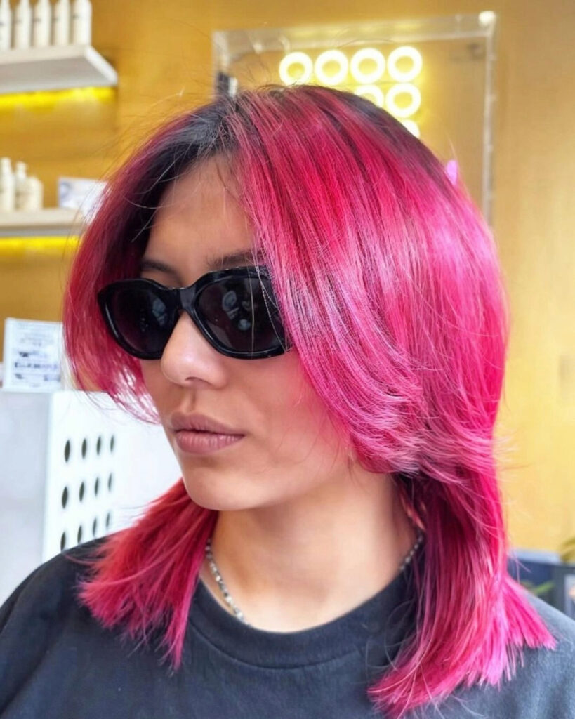 Hot pink layered cut at Gusto Hair London