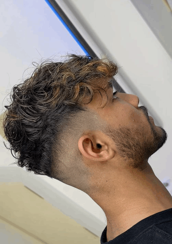 low taper fade with textured fringe