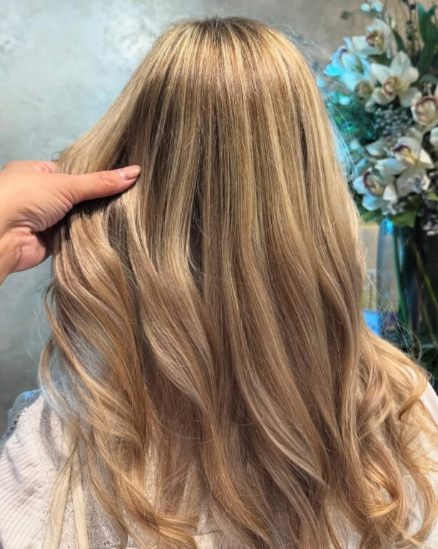 Warm, blended balayage on long hair, corrected at Gusto Hair, London