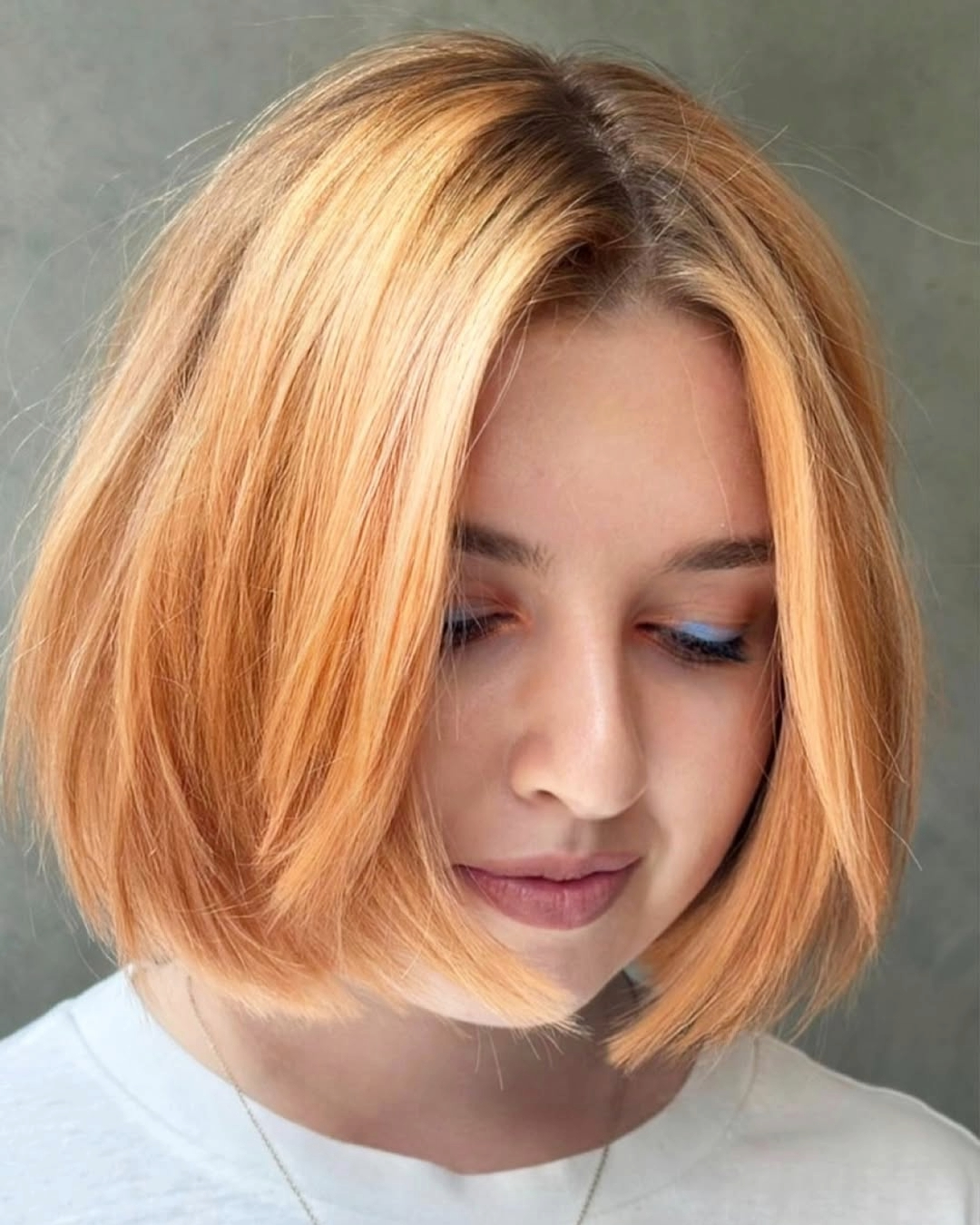 peach coloured jaw length bob at gusto salons london