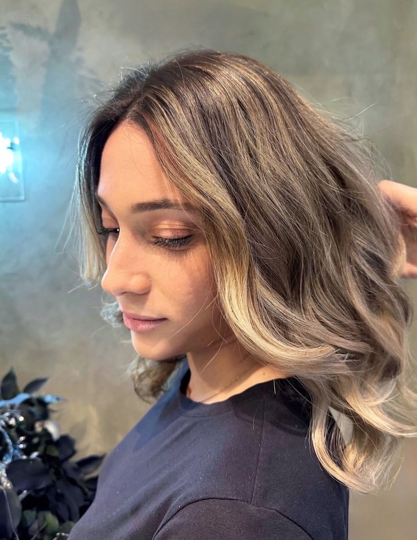 Ash blonde balayage shoulder-length textured waves
