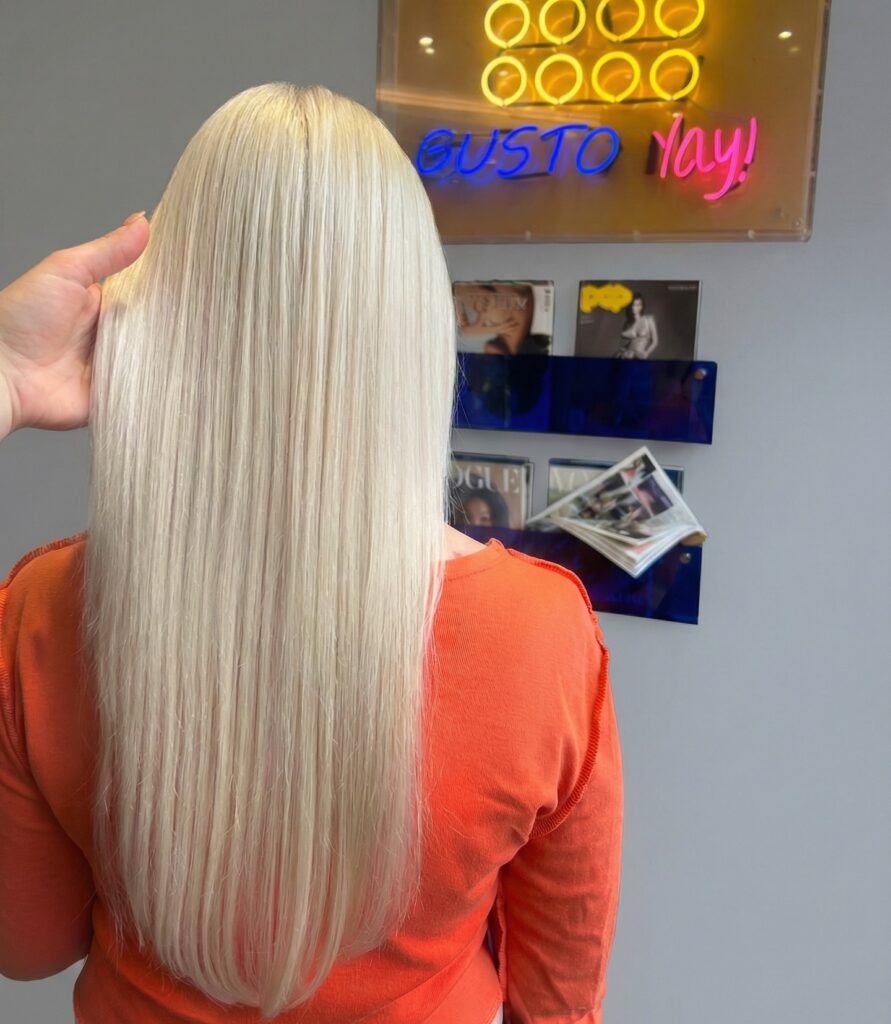 Platinum blonde long straight sleek hair