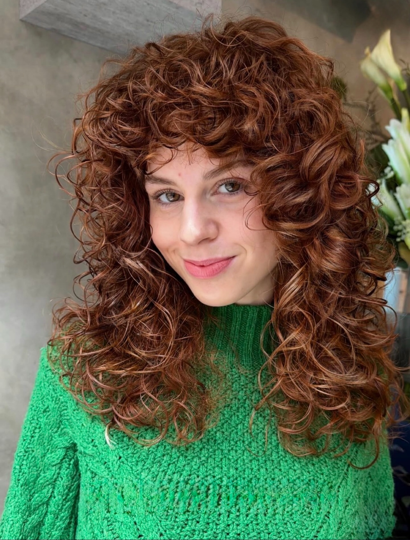 Defined copper curls at Gusto Hair London