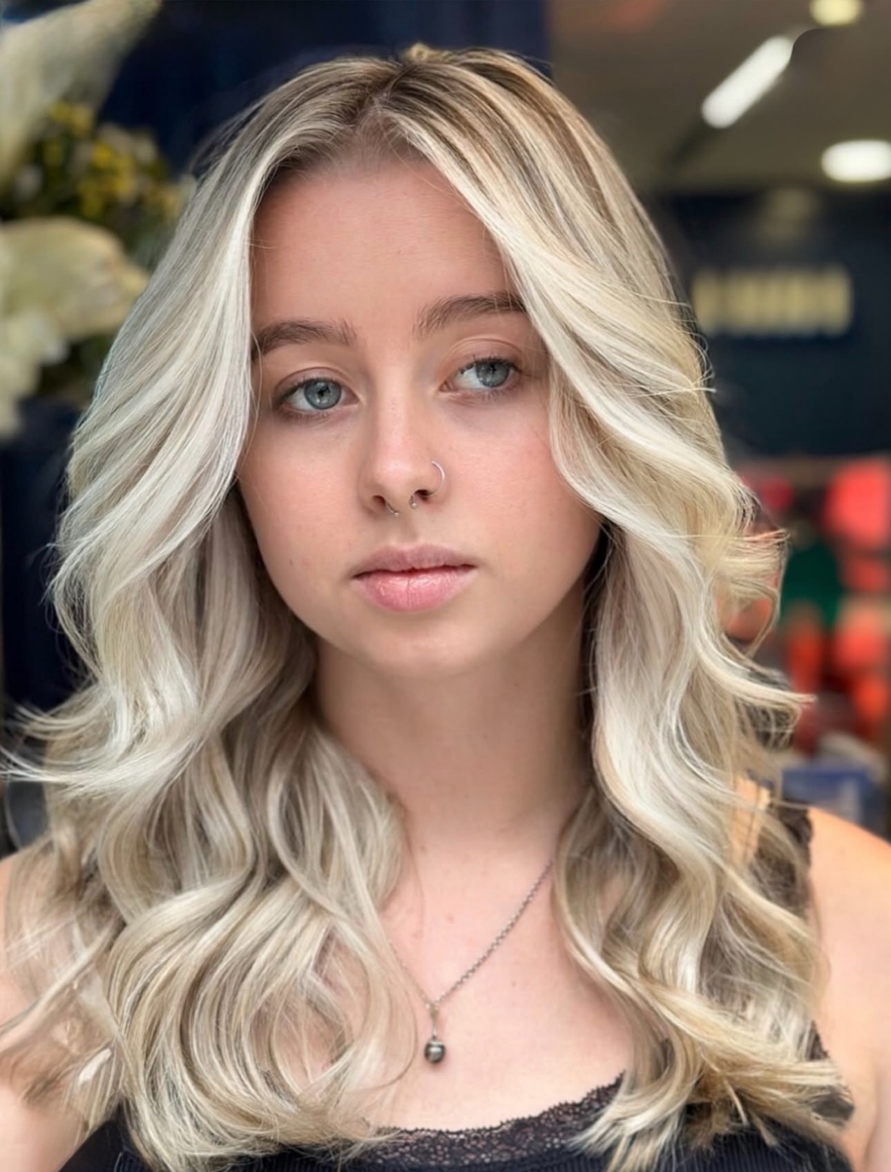 Cool ash blonde long wavy textured layers