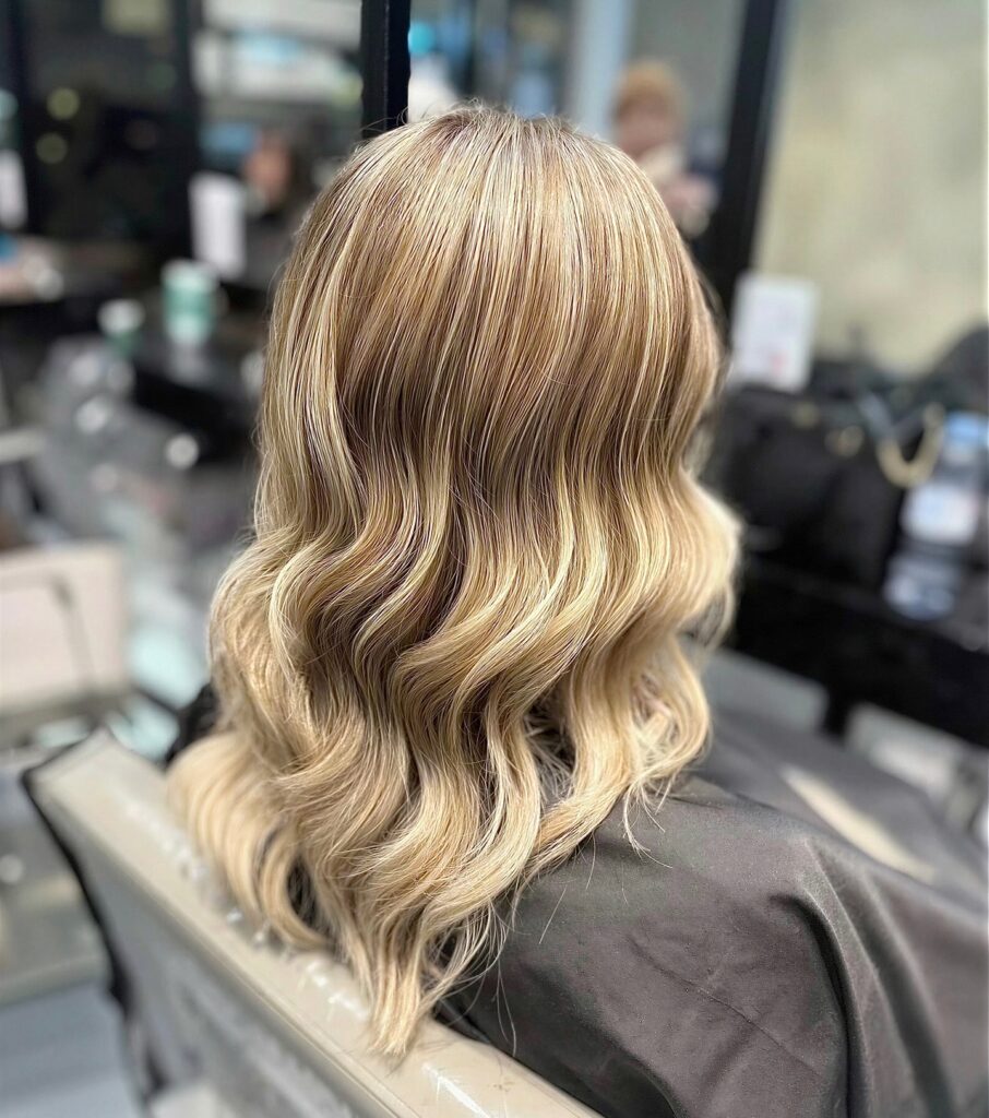 Beautiful polished blonde hair colour at Gusto Hair London salon