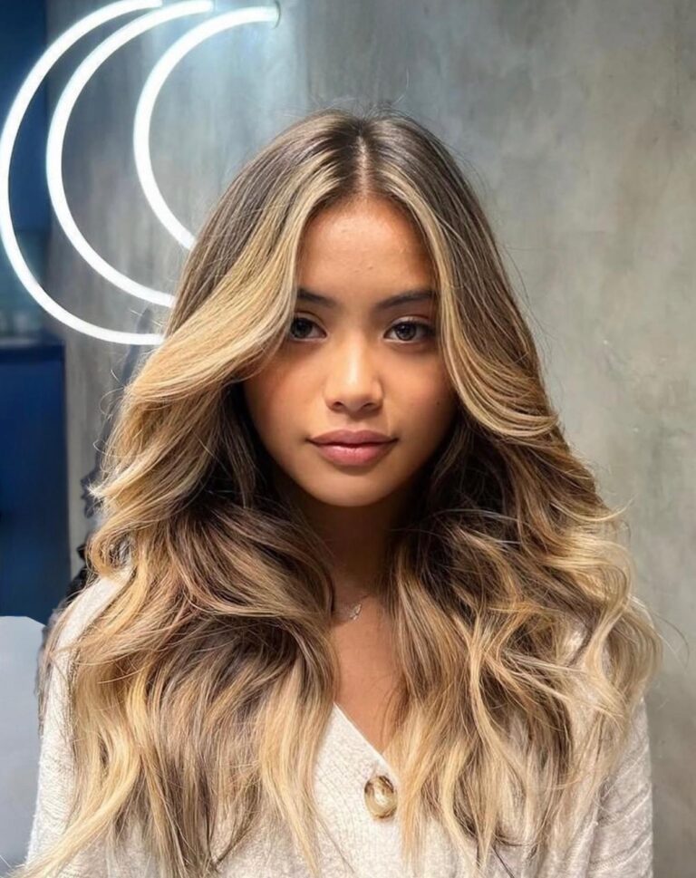 Face-framing blonde balayage on long brunette hair at Gusto Hair, Covent Garden and Oxford Street