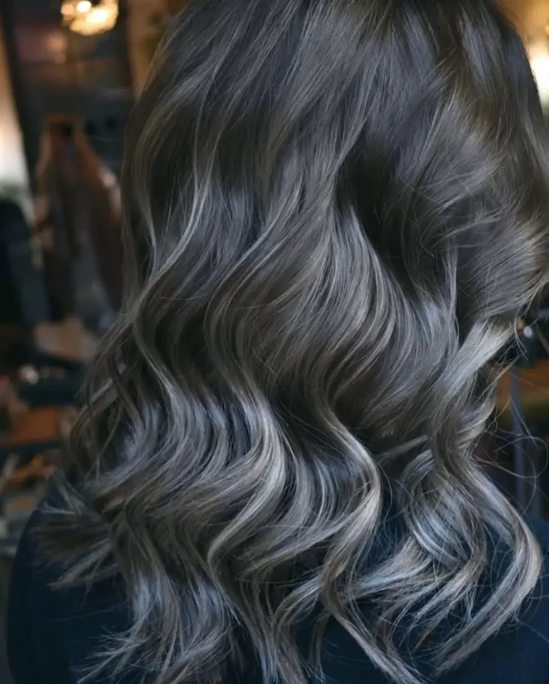 Smoky dark ash balayage on long black hair at Gusto Hair London