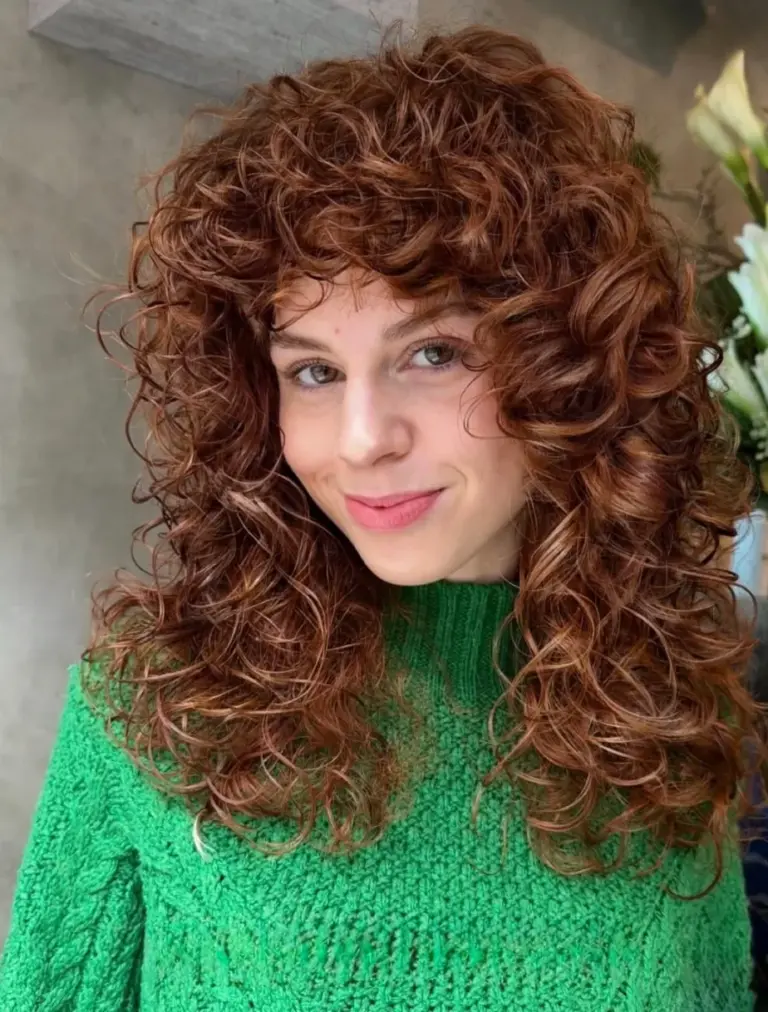 Copper curly perm with a soft curtain fringe, ladies perm at Gusto Hair, London
