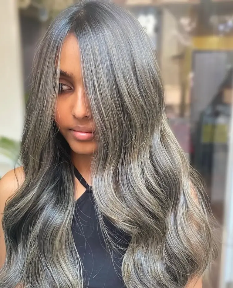 Grey and silver balayage on long dark hair at Gusto Hair London