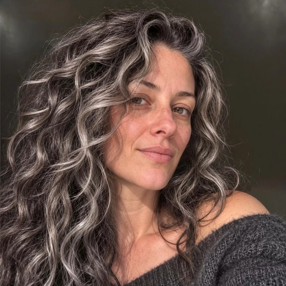 Natural silver grey curls after a grey transition at Gusto Hair London