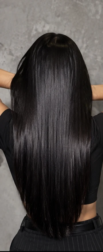 Long, jet black hair, sleek and glossy, seen from behind