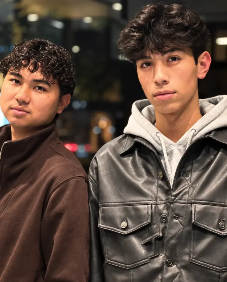 Two gents after their perms at Gusto Hair, London: tight curls and soft textured waves